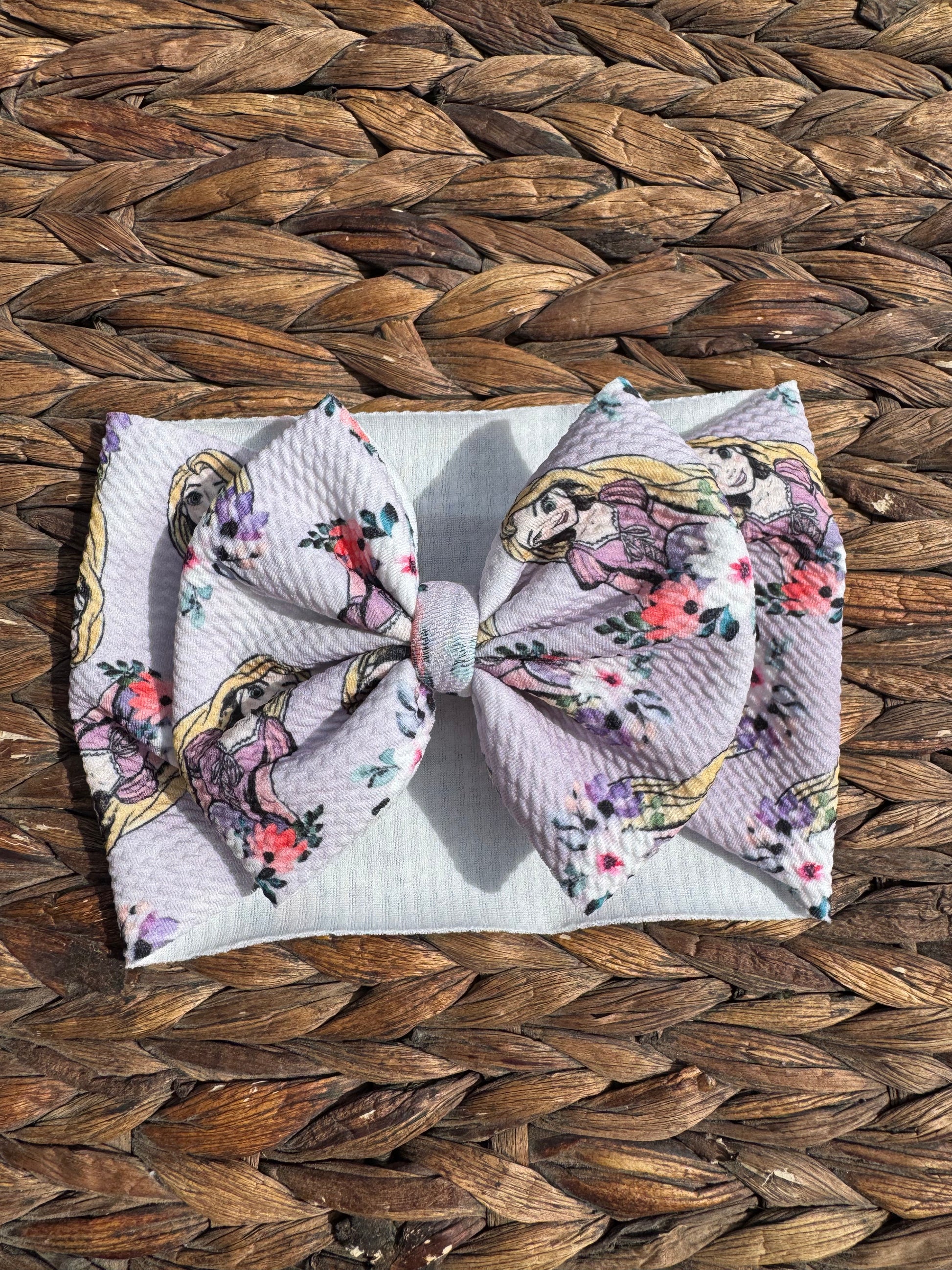 Tangled bow head wrap